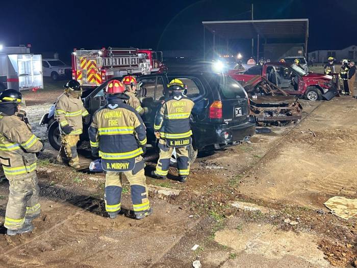 [City of Winona Firefighters recently train for Jaws of Life emergencies at Parker Wrecker Services.]